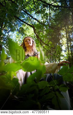Beautiful Seductive Dryad. Pagan Spirit Of The Forest. Portrait Of Beautiful Dryad. Fairy Who Loves 