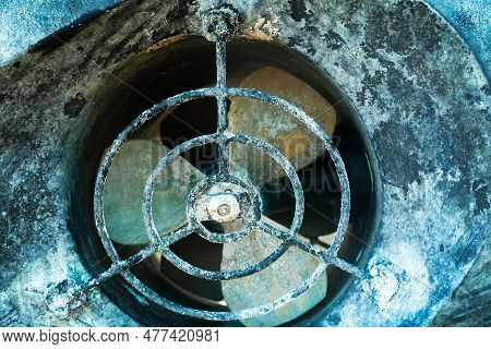 Bow Thruster On The Ship's Hull. Propeller In The Tunnel Of The Yacht Hull For Maneuvers In The Wate