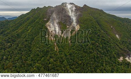 Aerial View Of Slope Of Sibayak Volcano With Volcanic Activity And Mountains With Jungle. Sumatra, I