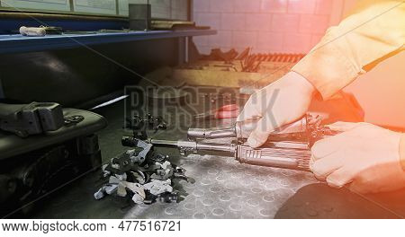 Repair Of Small Arms In A Special Workshop. Details In The Hands Of A Master Gunsmith. Kalashnikov M