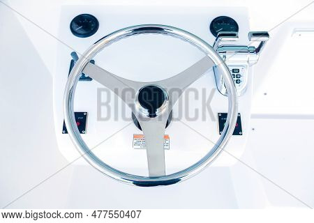 Motor Yacht Control Panel. Steering Wheel, Gear Levers, Control Button Tachometer. Luxury Yacht Navi