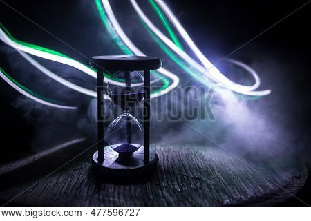 Hourglass As Time Passing Concept For Business Deadline, Urgency And Running Out Of Time. Sandglass,