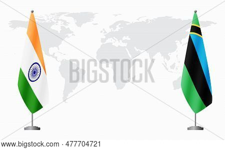 India And Zanzibar Flags For Official Meeting Against Background Of World Map.