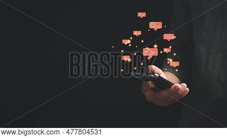 Living The Digital Lifestyle On Vacation With Social Media. Man Using Smartphone To Follow, Like, An