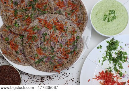 Finger Millet Or Ragi Uthappam. Healthy Pan Cake Made Of Fermented Batter Of Finger Millet And Lenti