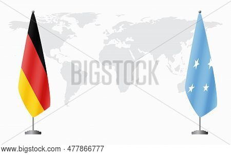 Germany And Micronesia Flags For Official Meeting Against Background Of World Map.
