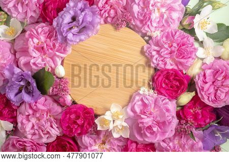 Flat Wooden Podium For Advertising Cosmetic Products. View From Above. Flat Lay Flowers Frame. View 
