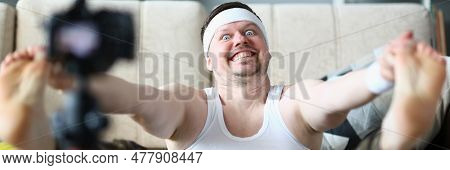 Sports Male Blogger Doing Morning Exercises Warming Up In Living Room In Front Of Camera. Sports Onl