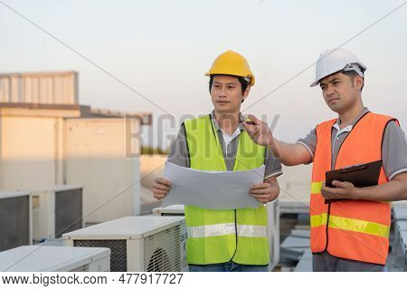 Engineers Use Blueprint Check Air Condition Systems On Site. Contractor And Inspector Inspection Com