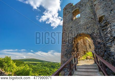 Wooden Bridge To The Entrance Gate Of The Somoska Medieval Castle, Slovakia, Europe.