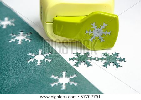 Holepunch and paper snowflakes