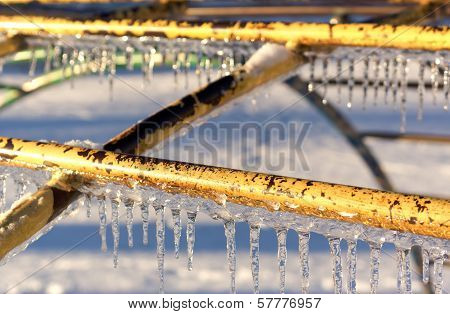 Icicles on playground equipment after an ice storm.
