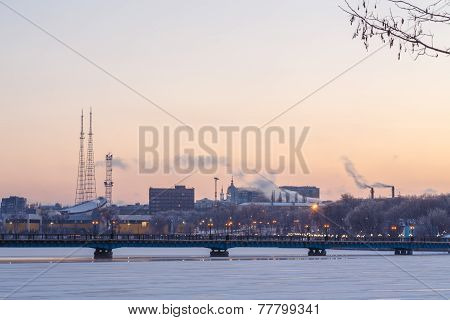 Bridge city landscape in snowy winter night