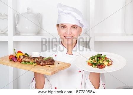Chef-cook presenting meals