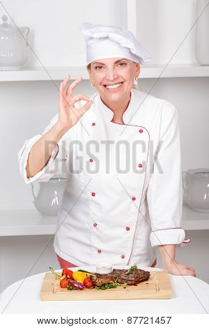 Chef-cook presenting meals