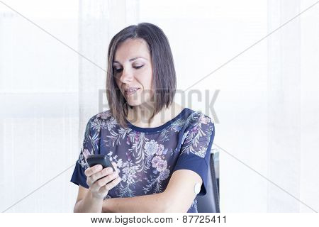 Girl Looking At A Reader .