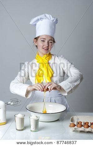 Cook Breaking Egg