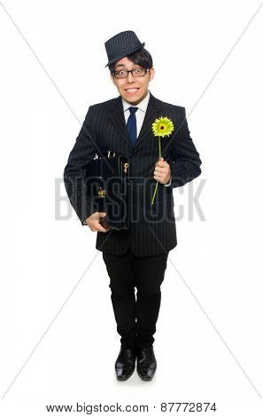 Young man in black costume with flower isolated on white