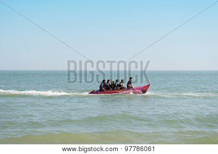 Tourists Enjoying Ride Banana Boat Adventure