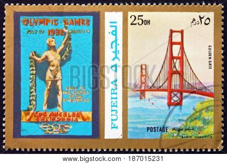 FUJEIRA - CIRCA 1972: a stamp printed in the Fujeira shows Poster of Los Angeles 1932 Olympics Golden Gate Bridge circa 1972
