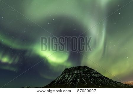 Northern Light Aurora Borealis At Kirkjufell Iceland With Fully Start In The Sky