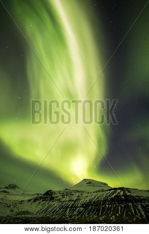 Northern Light Aurora Borealis At Kirkjufell Iceland With Fully Start In The Sky