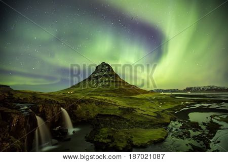 Northern Light Aurora Borealis At Kirkjufell Iceland With Fully Start In The Sky