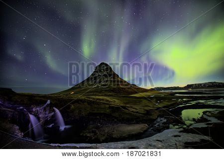 Northern Light Aurora Borealis At Kirkjufell Iceland With Fully Start In The Sky