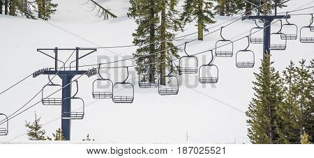 Empty ski lift on a snowy day