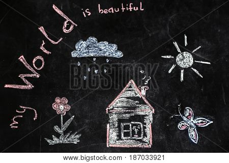 Chalk Drawing Of House And Sun On A Black Background,