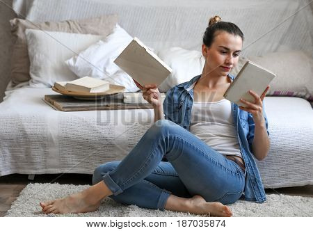 Girl Reading A Book In A Cozy Room