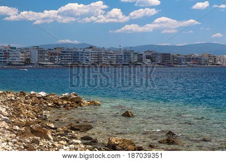 Loutraki Cityline view from Aegean sea in Greece.