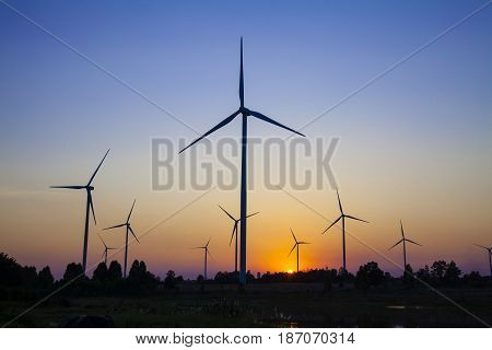 wind turbine sunset background ecosystem vintage. wind turbine silhouette. wind turbine power. wind turbine tower. wind turbine technology.