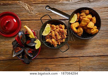 Fish seafood tapas adobo squid and steamed mussels of spain