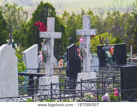 Two crosses and graves in the old cemetery