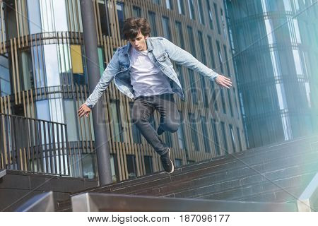 Young Man Doing Parkour In The City