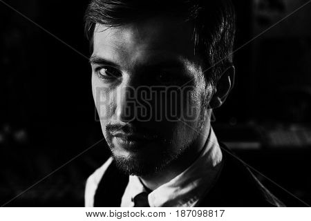 Black And White Dramatic Portrait Of A Handsome Confident Man, 30-35 Years Old. Strong Face Looking