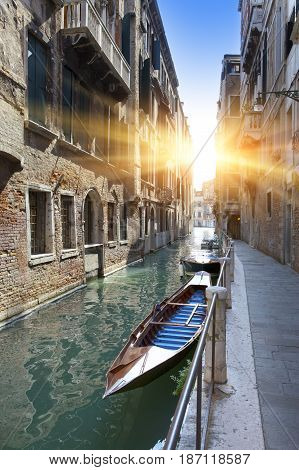 channel and gondolas Venice Italy in a sunny day