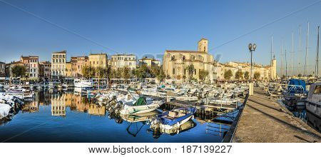 Yachts Reflecting In Blue Water In The Old Town Port Of La Ciotat, Marseilles District, France, In T