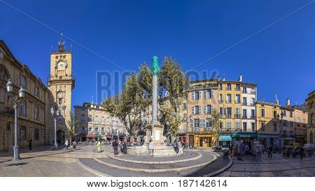 People Visit The Central Market Place With The Famous Hotel De Ville In Aix En Provence, France.