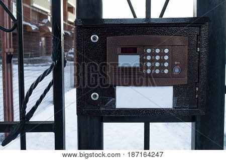 Intercom in the yard of living house. Security and privacy concept.