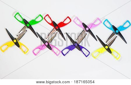 Colorful Scissors in different arrangements and shapes