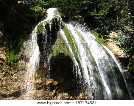 Dzhur-Dzhur waterfall in the rainforest. Ukraine. Crimea.