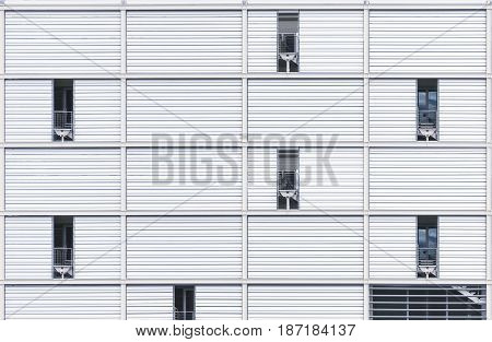 Building construction site. White temporary construction frame