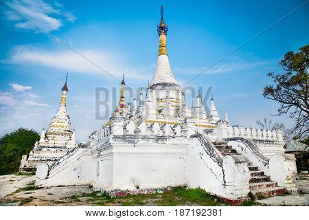 The brick yellow Maha Aung Mye Bon Zan monastery on the Inwa royal site Inn Wa, near Mandalay. (Burama)