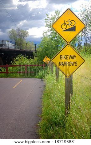 Bikeway narrows sign on bike path in Kalispell, Montana