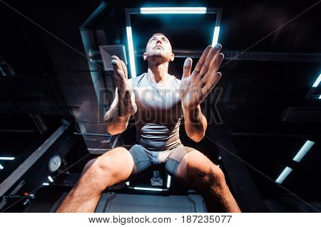 Male Powerlifter Hand In Talc And Sports Wristbands Preparing To Bench Press