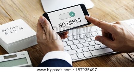 Hands working on digital device network graphic overlay