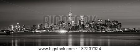 Panoramic view of Lower Manhattan Financial District skyscrapers in Black & White at dawn from New York City Harbor