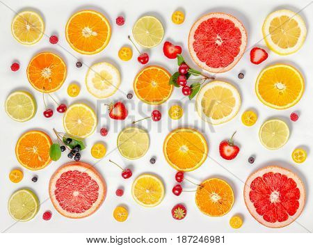 Flat Lay Trendy Seamless Pattern Sliced Mixed Citrus Fruits Like Background With Different Berries,
